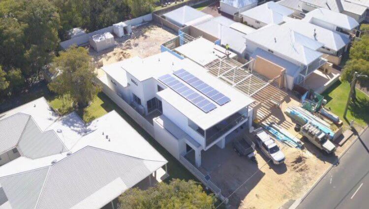 commercial solar installed atop flat roofed property