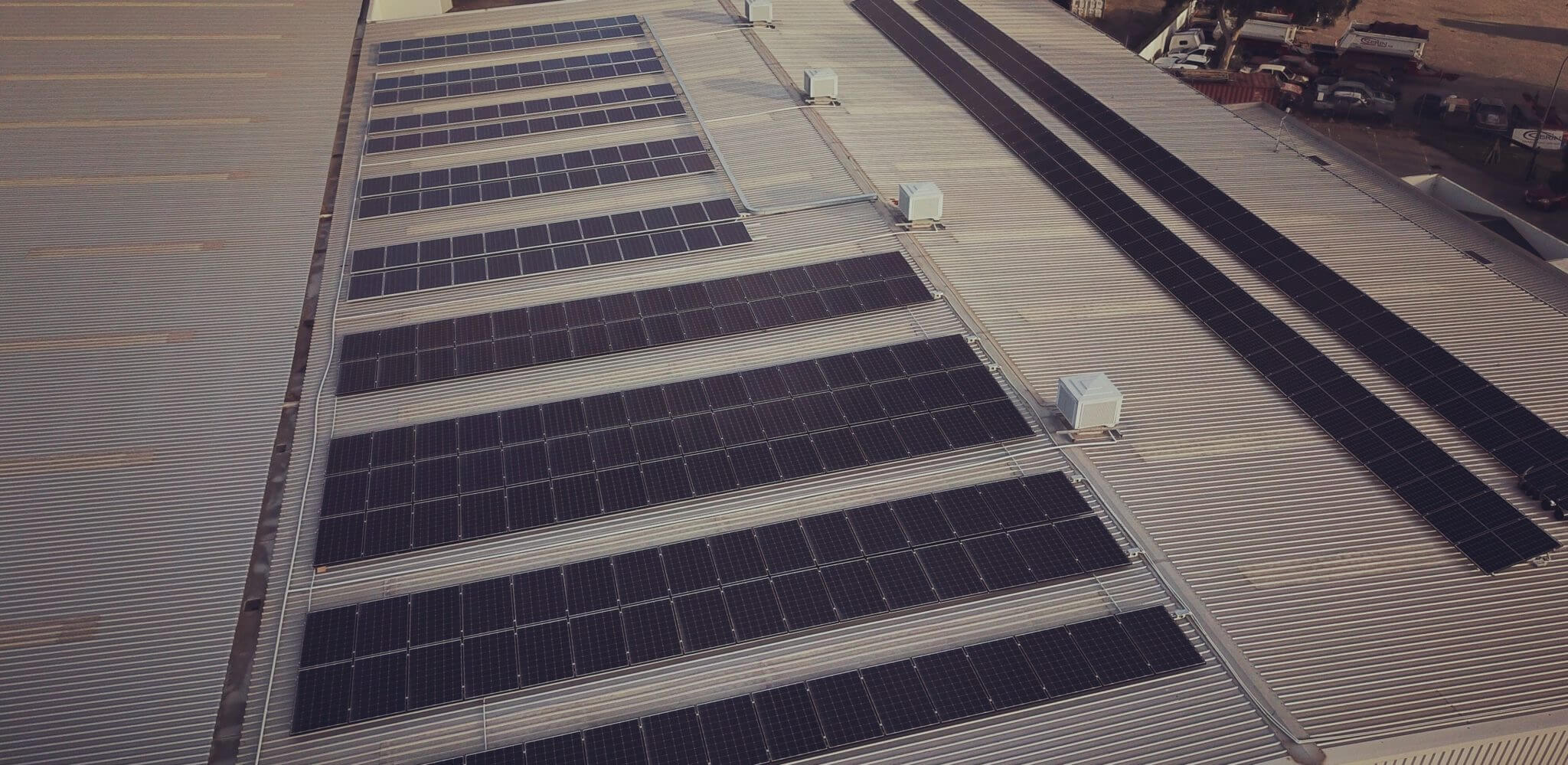 solar panels installed on flat-roofed commercial property